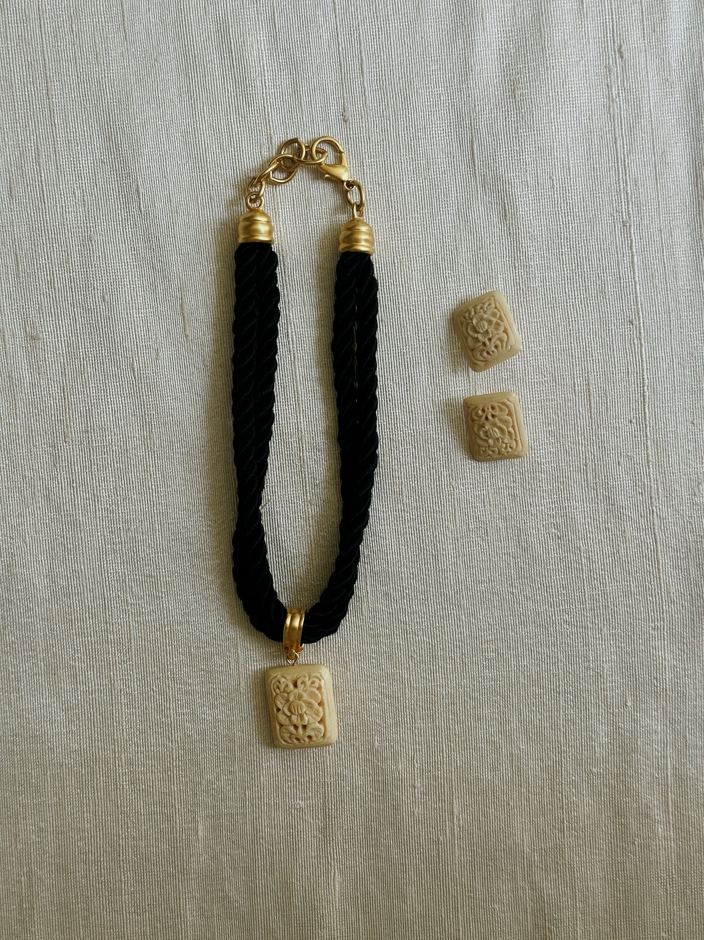 Carved Ivory Tone Clip On Earrings