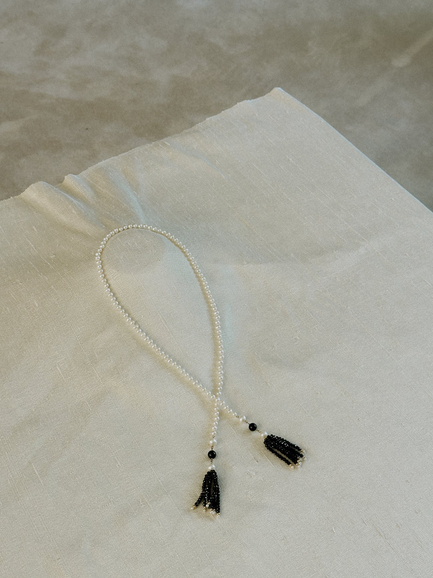 Pearl & Black Bead Tassel Necklace