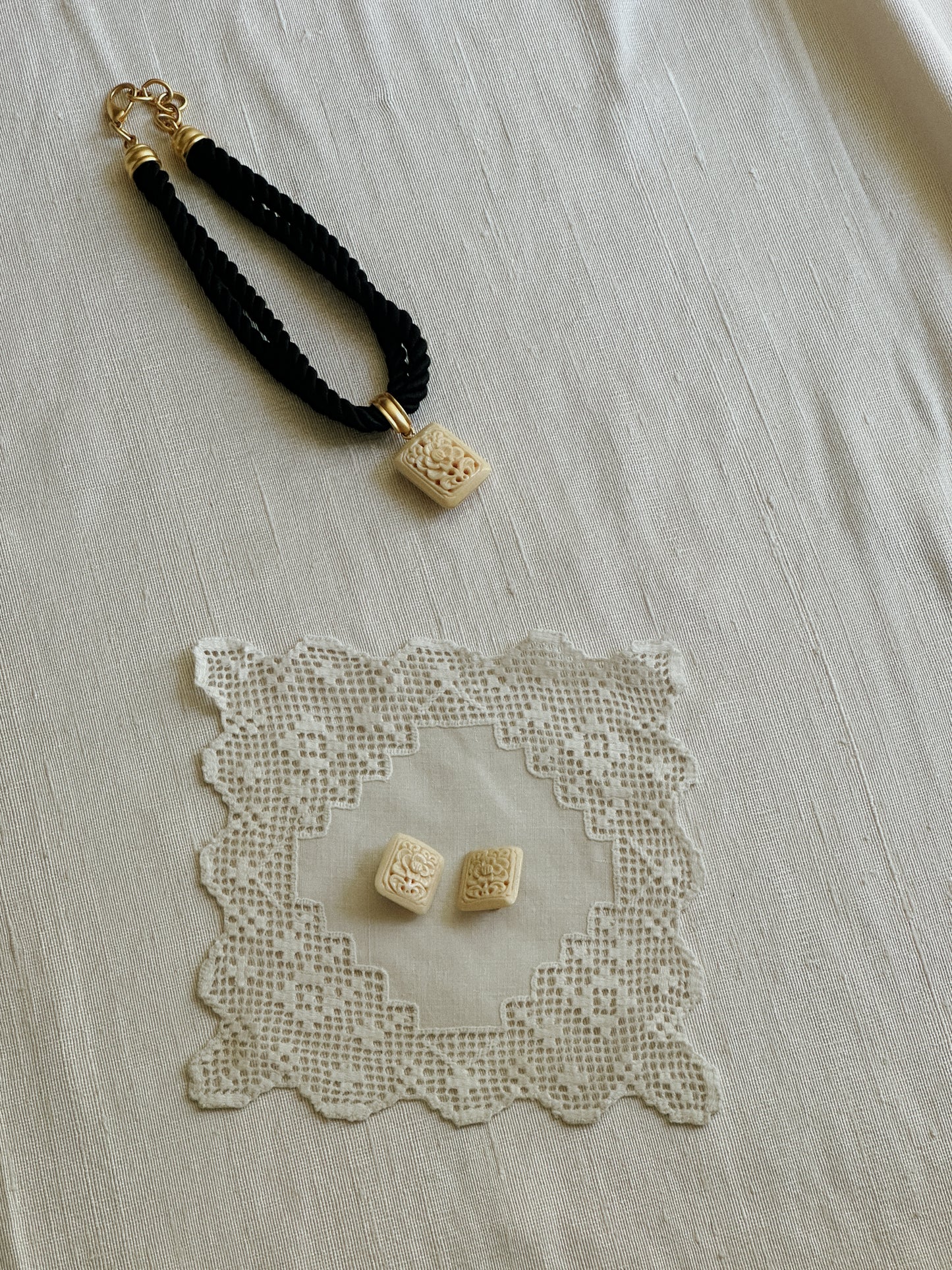 Carved Ivory Tone Clip On Earrings