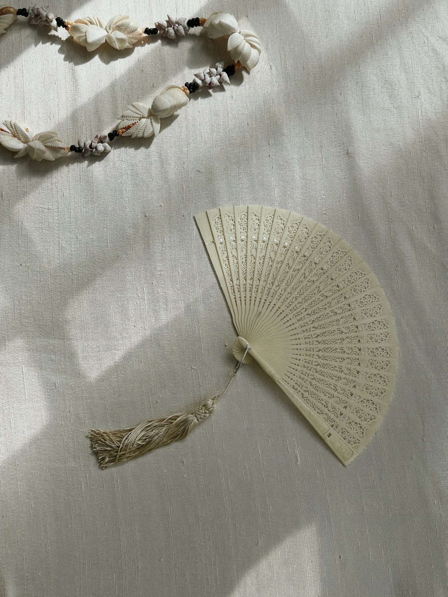 Carved Ivory Tone Celluloid Folding Fan 
