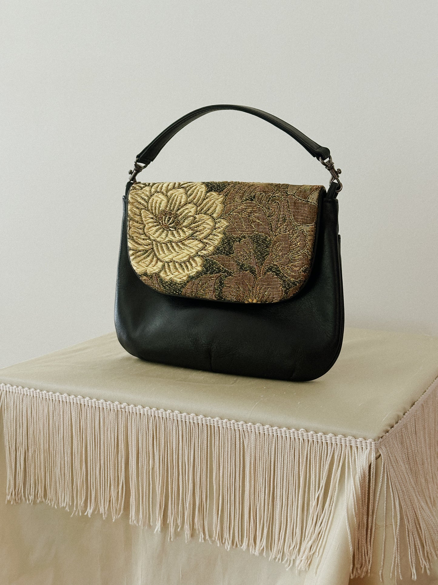 Black Leather Bag with Gold Brocade Detailing
