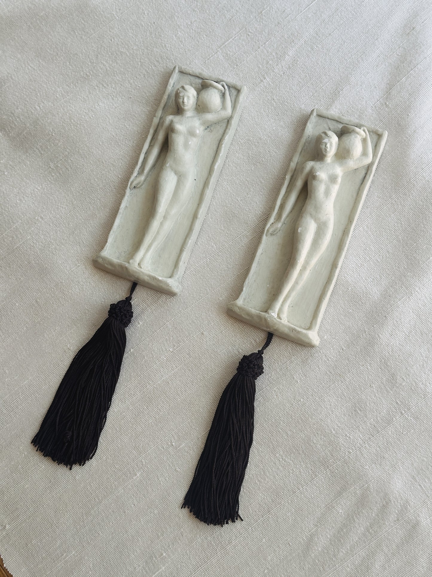 Pair of Cast Plaster Wall Plaques