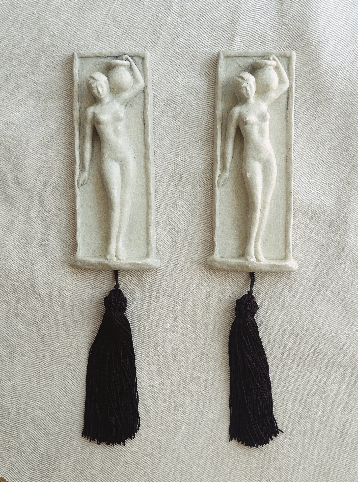Pair of Cast Plaster Wall Plaques