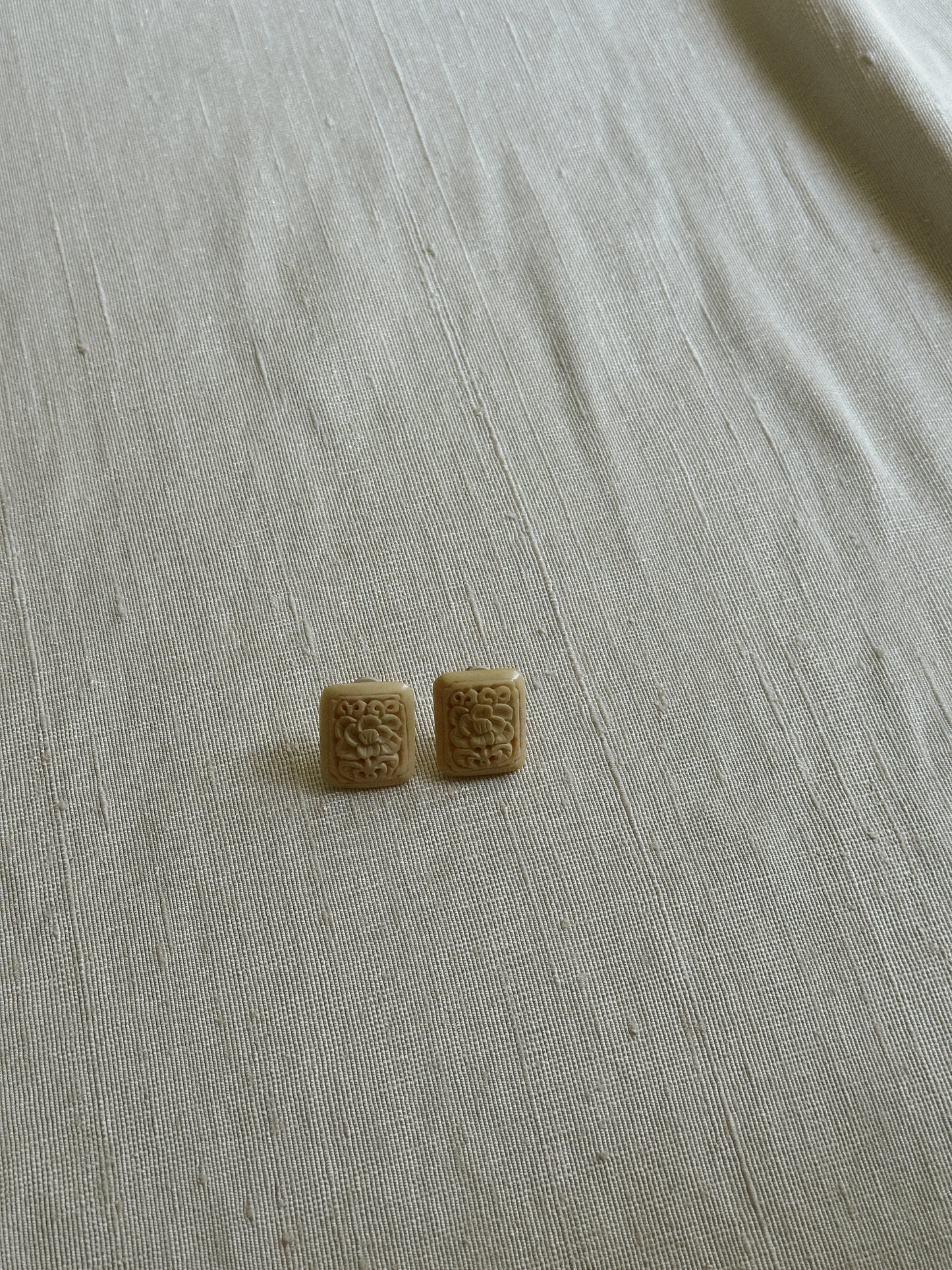 Carved Ivory Tone Clip On Earrings