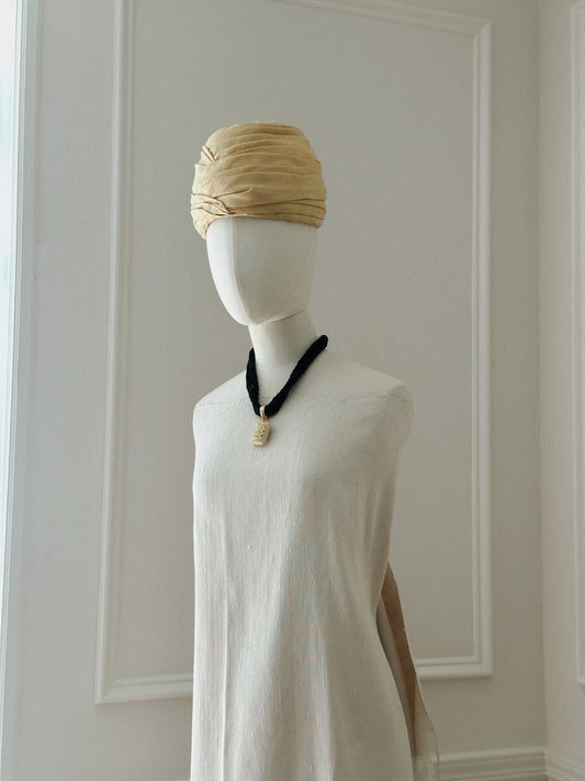 Black Rope Necklace with Carved Ivory Tone Pendant